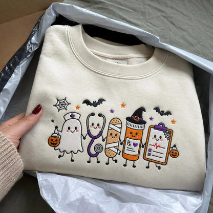 Halloween Nurse Embroidered Sweatshirt, Spooky Nurse Hoodie, Cute Ghost Nurse Shirt, RN Fall Crewneck, Embroidered Medical Gift